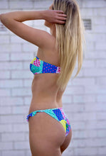 Bikini briefs with side frills in patchwork