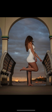 Halter neck white mini dress with shell detail