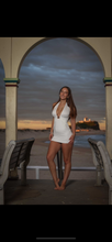 Halter neck white mini dress with shell detail