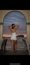 Halter neck white mini dress with shell detail