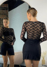 Black lace mini dress with stitched in bra