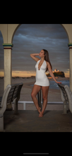 Halter neck white mini dress with shell detail