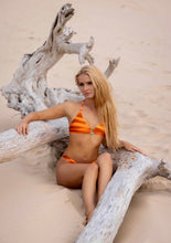 Halter neck sweetheart neckline 
With bamboo centrepiece in Sunset