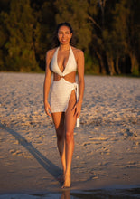 White one piece with cut outs